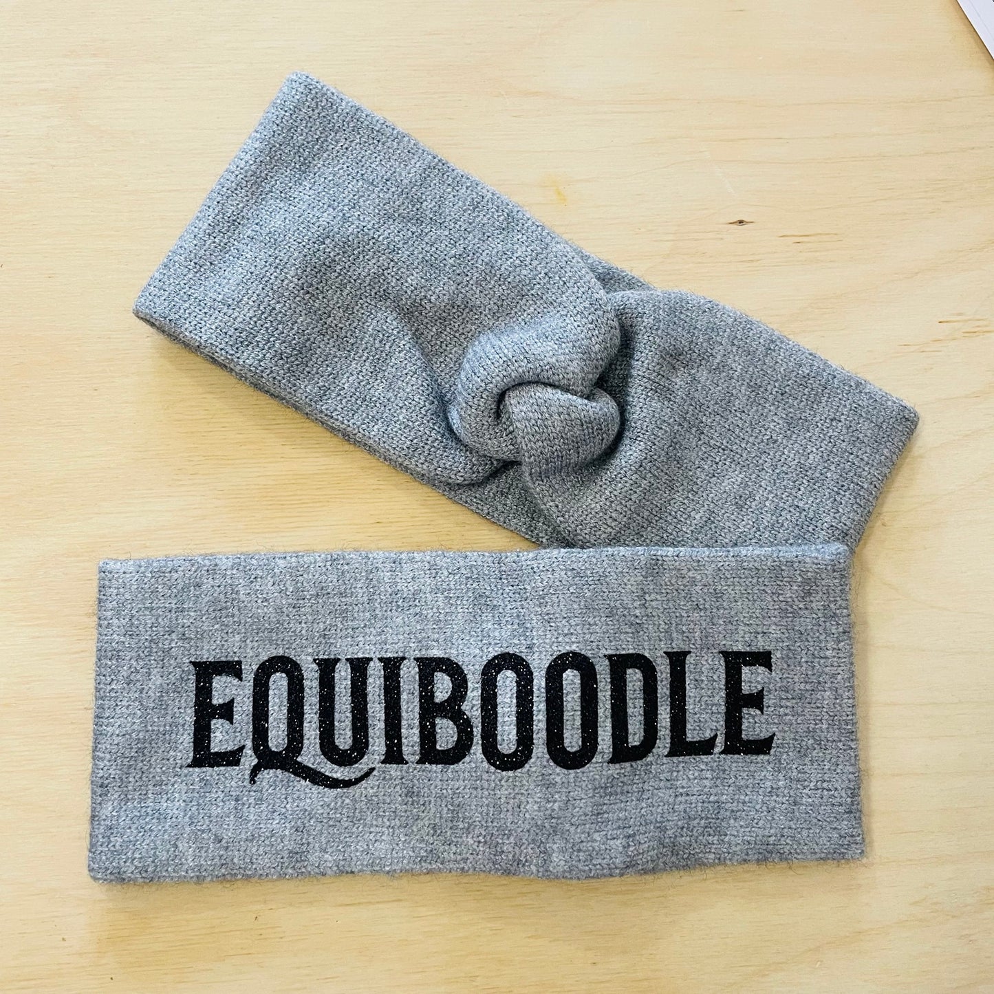 Equiboodle grey knitted headband with black sparkle logo