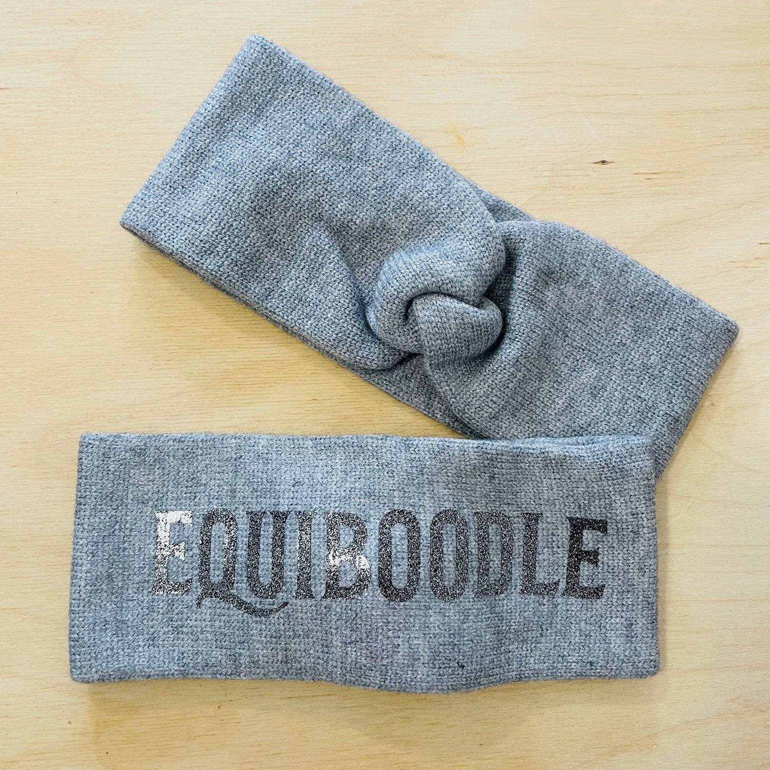 Equiboodle grey knitted headband with black glitter logo