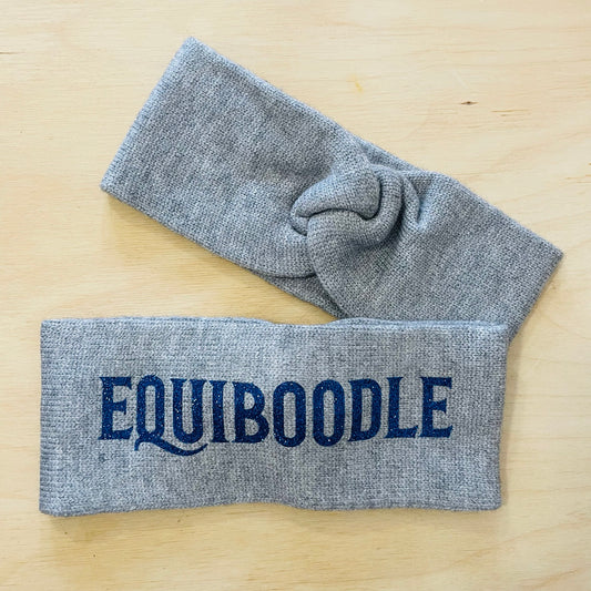 Equiboodle grey knitted headband with blue sparkle logo