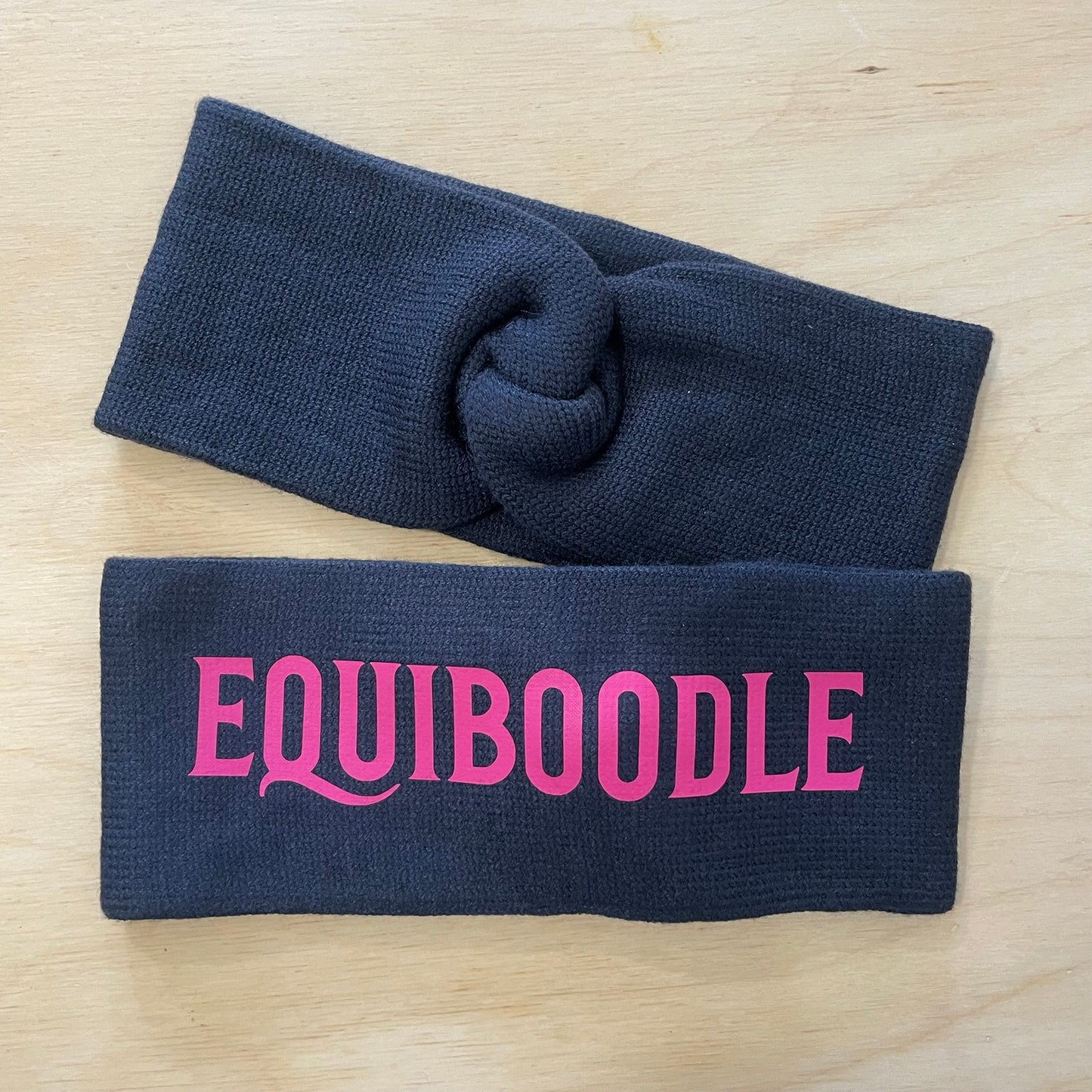 Equiboodle navy knitted headband with pink logo