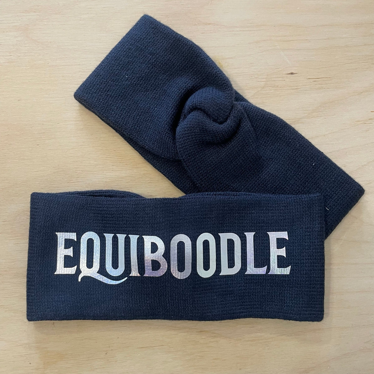Equiboodle navy knitted headband with shimmer logo