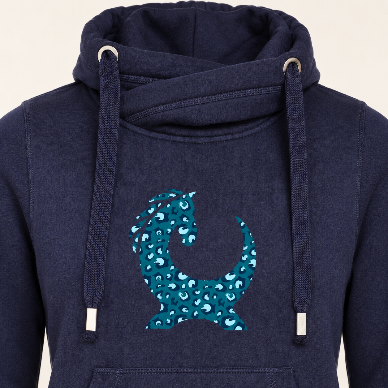 Close-up of the teal leopard horse logo and cowl neck on the Equiboodle Vixen hoodie
