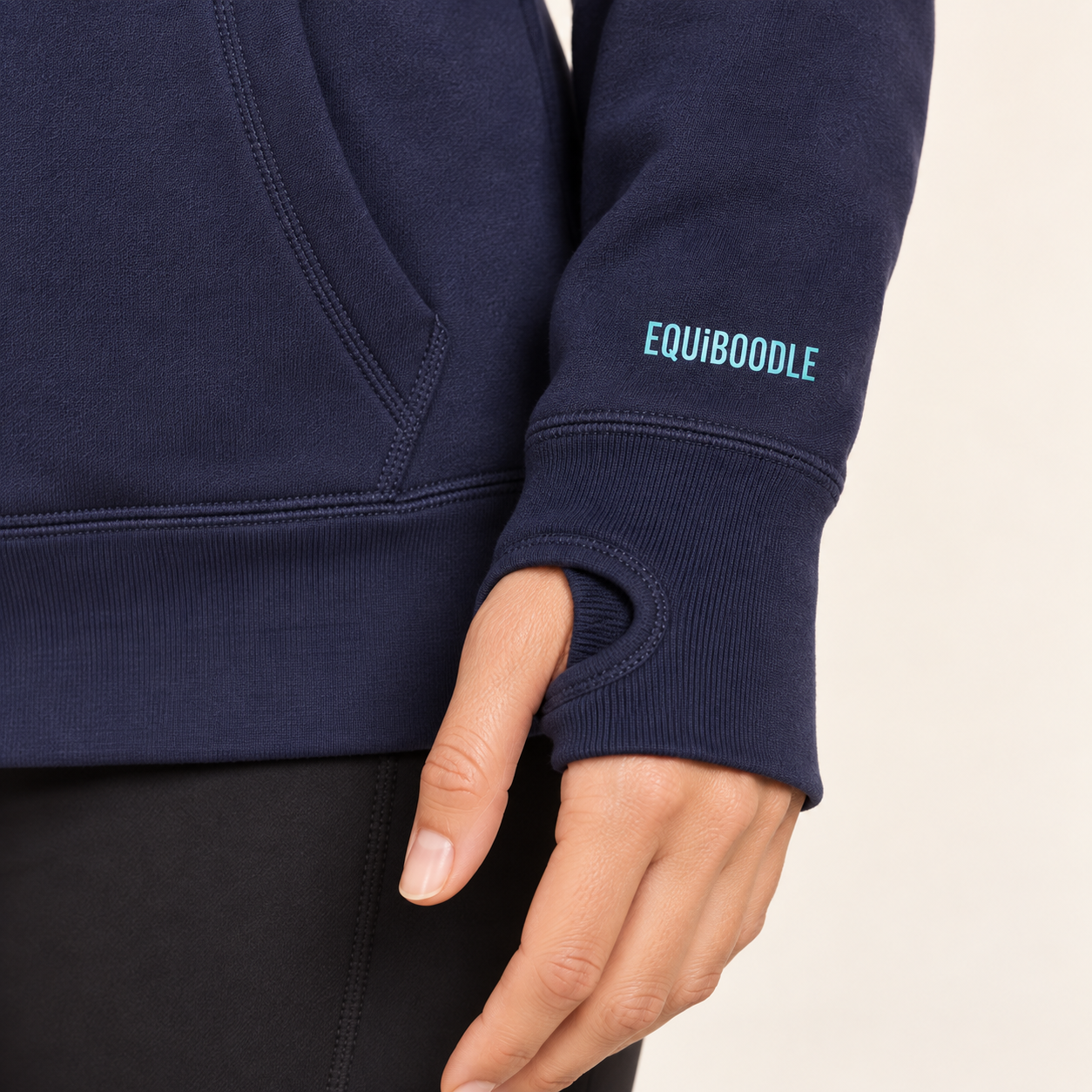 Close-up of the thumbhole cuff and Equiboodle sleeve branding